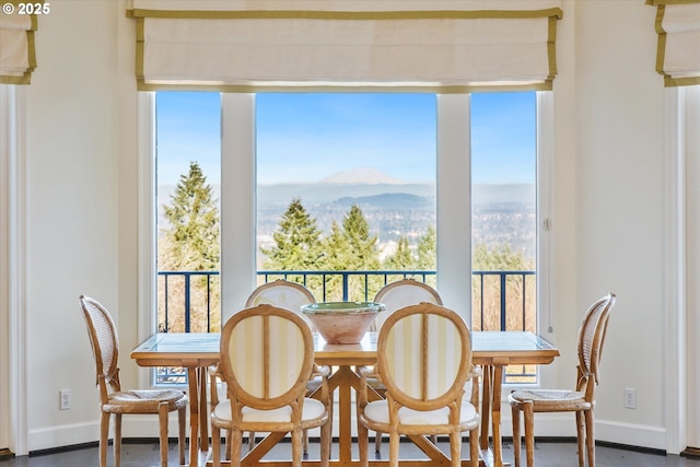 dining area with a mountain view