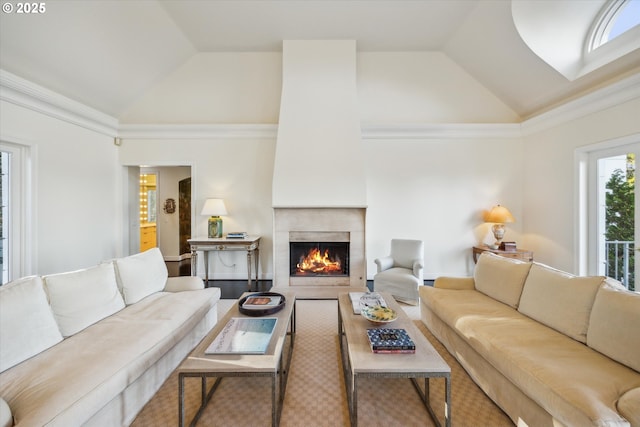 living room with lofted ceiling and crown molding