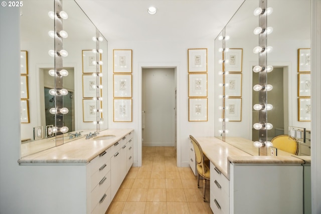 bathroom with tile patterned flooring and sink