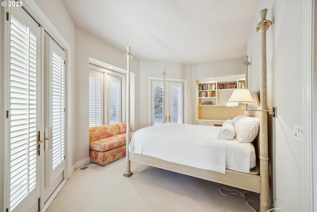 bedroom featuring carpet, french doors, and access to exterior