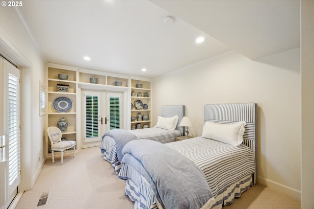 bedroom featuring access to outside, light carpet, ornamental molding, and french doors