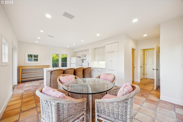 view of tiled dining space