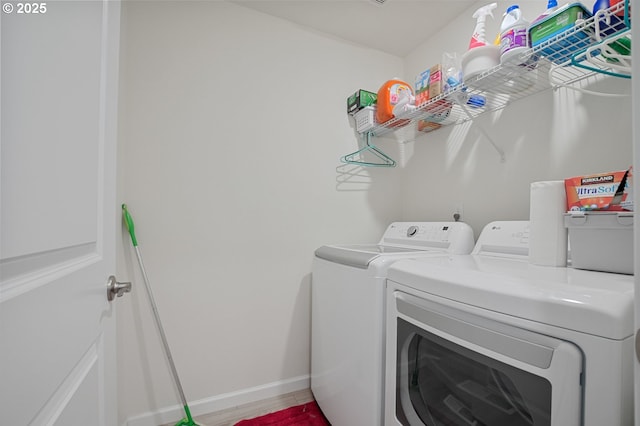 7110 NE 155th Pl, Vancouver, WA 98682 - laundry room featuring washer and clothes dryer, baseboards, and laundry area