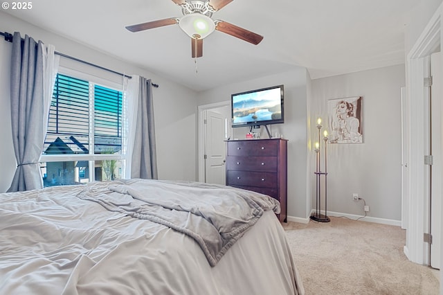 7110 NE 155th Pl, Vancouver, WA 98682 - bedroom with light carpet, a ceiling fan, and baseboards