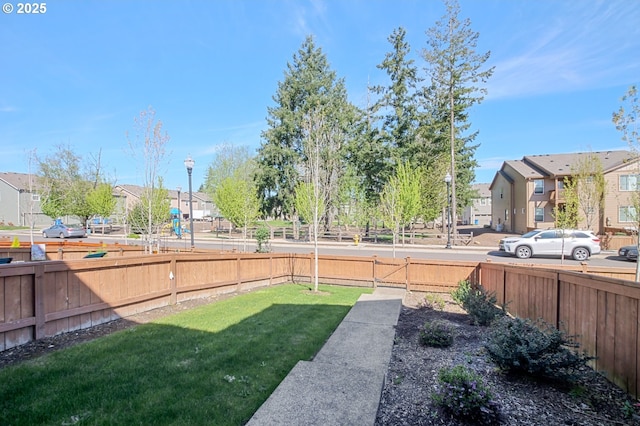 7110 NE 155th Pl, Vancouver, WA 98682 - view of yard with a residential view and a fenced backyard