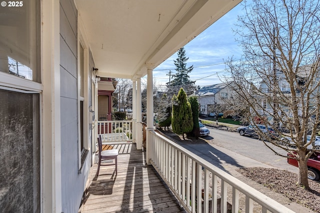 balcony featuring covered porch