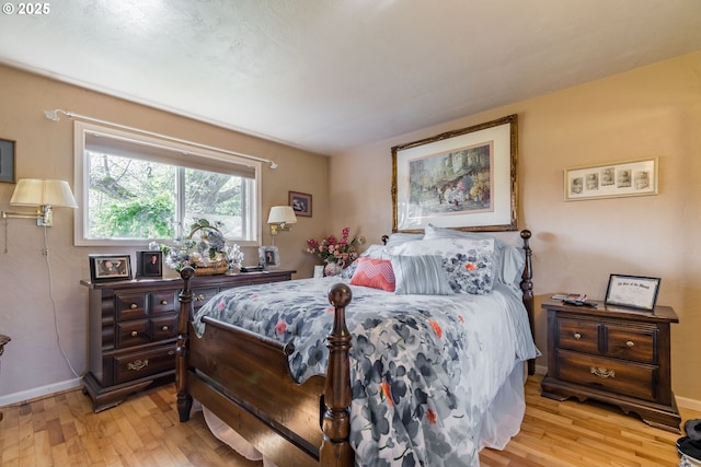 bedroom featuring light wood-type flooring