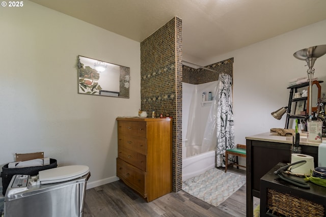 bathroom with vanity, shower / bath combo, and hardwood / wood-style flooring