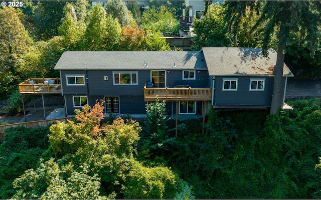 rear view of house with a deck