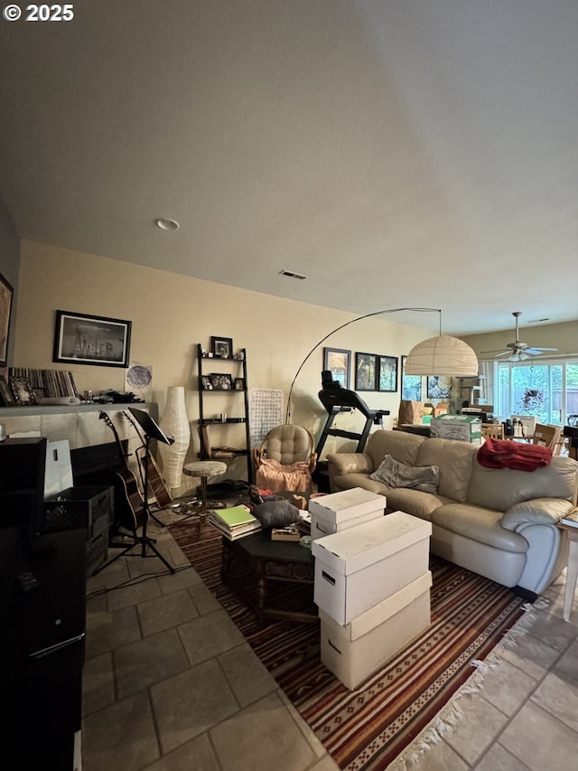 living room featuring a ceiling fan