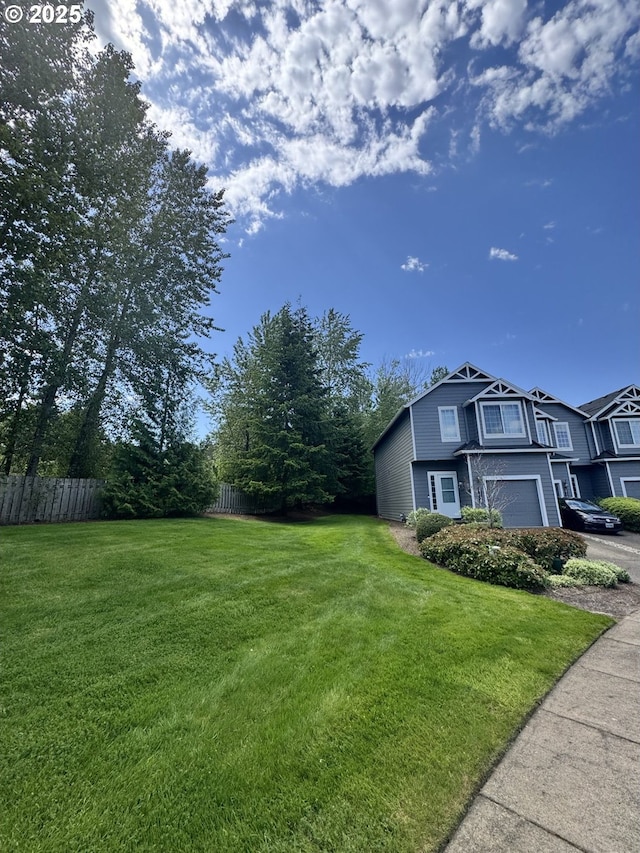 view of home's exterior with driveway and an attached garage