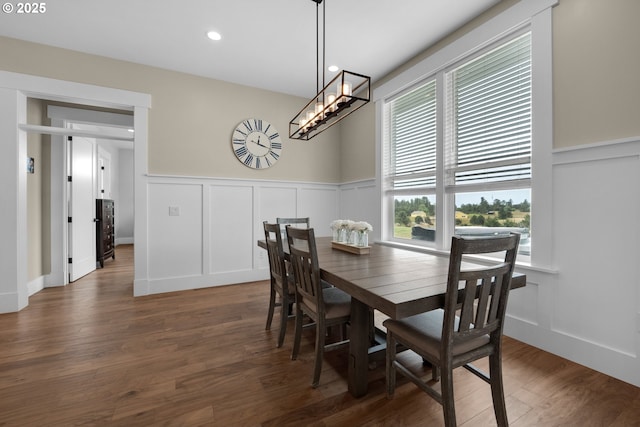 dining area featuring dark hardwood / wood-style floors