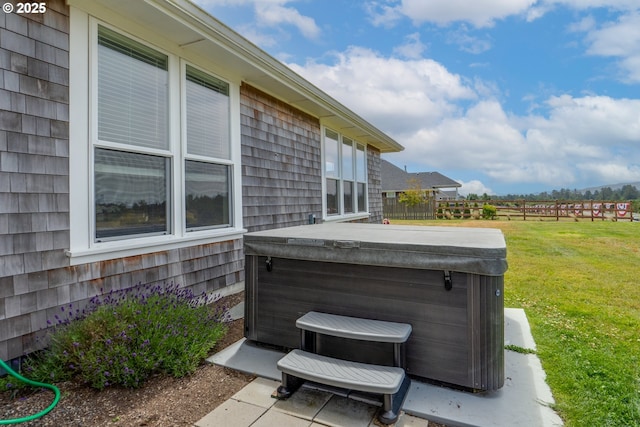 view of patio / terrace featuring a hot tub