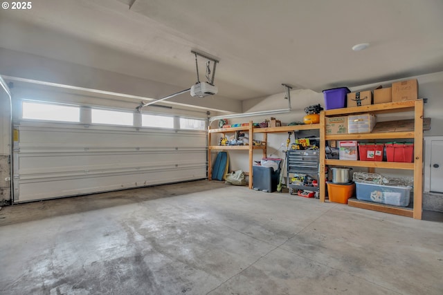 garage featuring a garage door opener