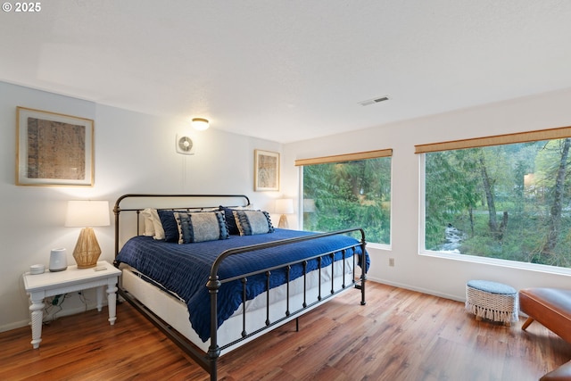 18308 NE Cole Witter Rd, Battle Ground, WA 98604 - bedroom featuring wood finished floors and baseboards