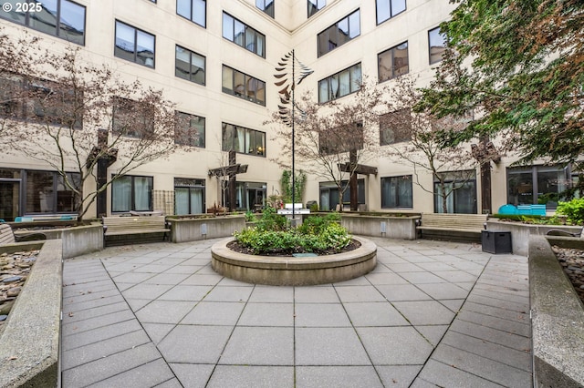 view of home's community with a patio