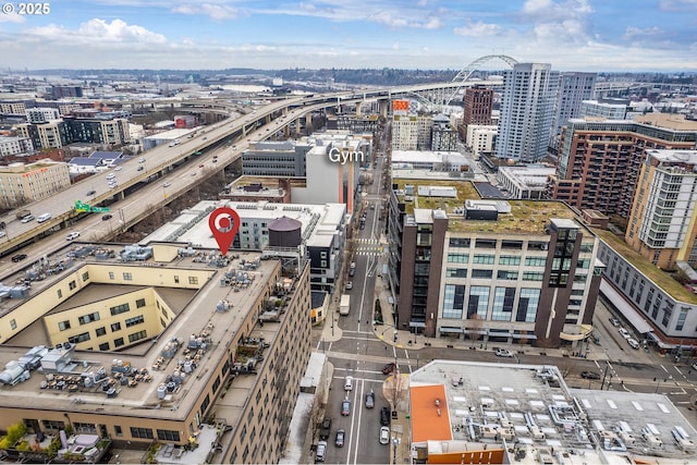 drone / aerial view featuring a city view