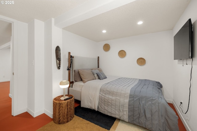 bedroom featuring recessed lighting and baseboards