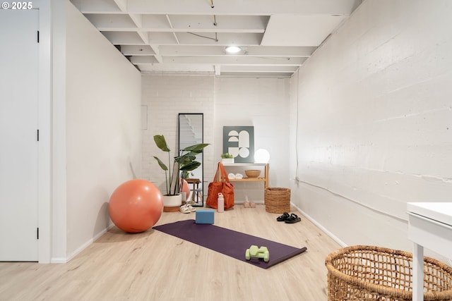 6833 NE 18th Ave, Portland, OR 97211 - workout room featuring wood finished floors and baseboards