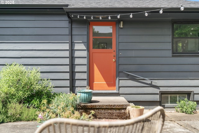 6833 NE 18th Ave, Portland, OR 97211 - property entrance with roof with shingles