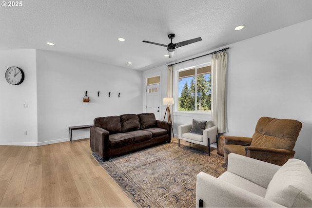 26815 NE Yacolt Rd, Yacolt, WA 98675 - living room with a ceiling fan, light wood-style flooring, recessed lighting, a textured ceiling, and baseboards