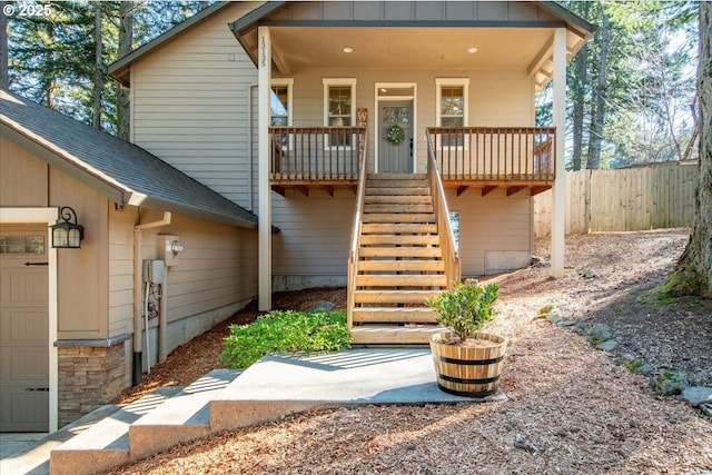 13135 SE Winston Rd, Damascus, OR 97089 - exterior space with fence, covered porch, roof with shingles, and a garage