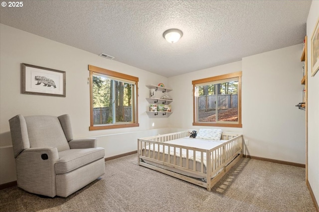 13135 SE Winston Rd, Damascus, OR 97089 - bedroom featuring a textured ceiling, visible vents, baseboards, and carpet