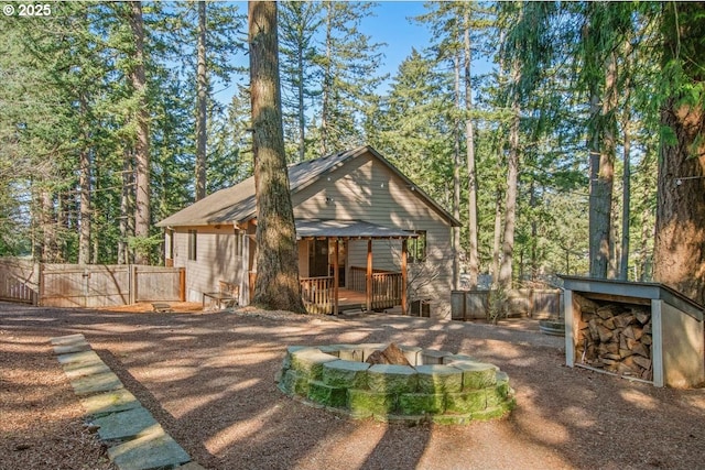 13135 SE Winston Rd, Damascus, OR 97089 - back of house with fence and an outdoor fire pit