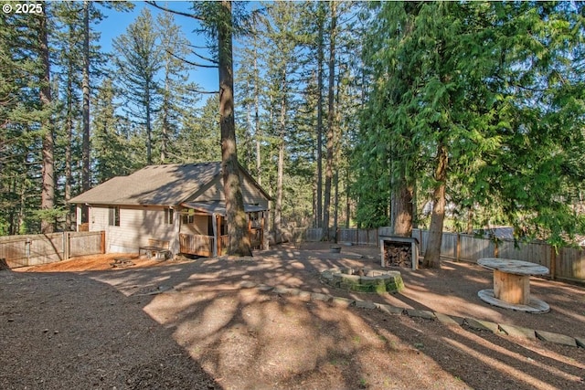 13135 SE Winston Rd, Damascus, OR 97089 - view of yard featuring a fenced backyard and a fire pit
