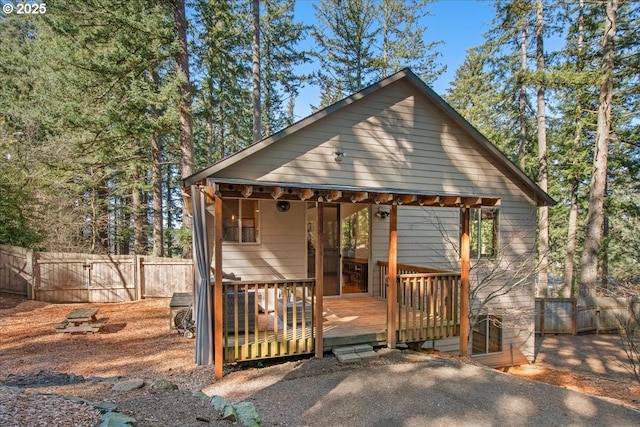13135 SE Winston Rd, Damascus, OR 97089 - view of front of home with fence, a gate, and a wooden deck
