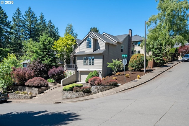16223 SW 146th Ave, Portland, OR 97224 - view of front facade with a garage and stairway