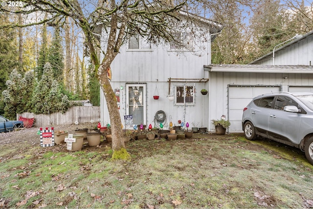 view of front of property with a garage