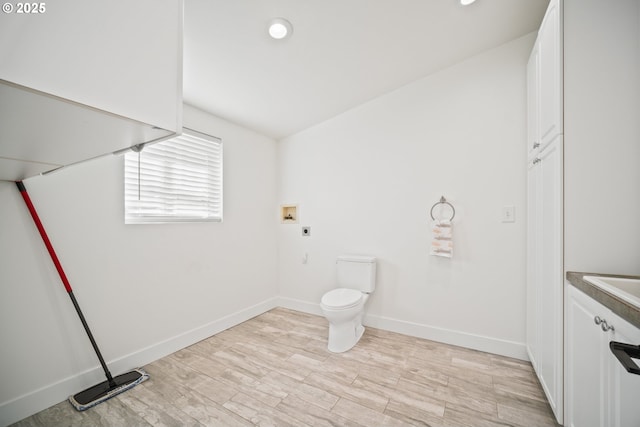 bathroom featuring recessed lighting, baseboards, toilet, and wood finished floors