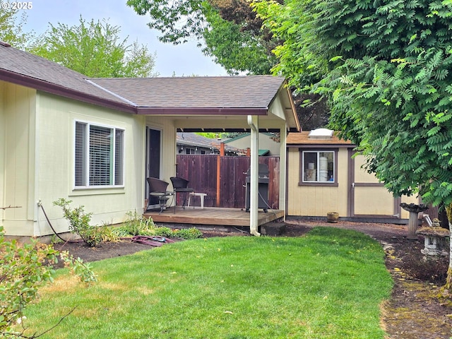 view of yard with a wooden deck