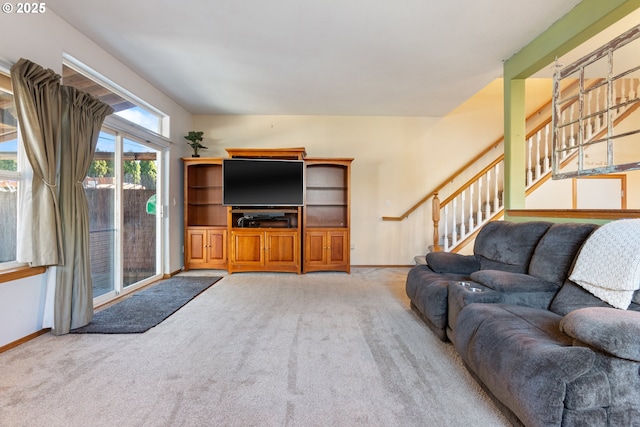 unfurnished living room with carpet