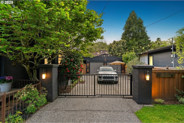view of gate with fence