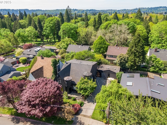 aerial view with a residential view and a forest view