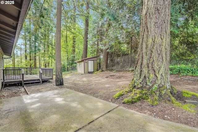 4718 SW Miles Ct, Portland, OR 97219 - view of patio / terrace featuring a shed, an outdoor structure, and a wooden deck