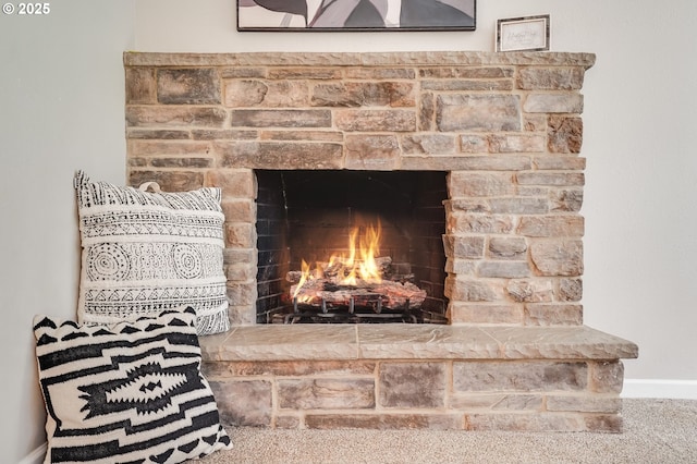 4718 SW Miles Ct, Portland, OR 97219 - detailed view of baseboards and a stone fireplace