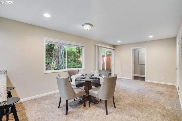 4718 SW Miles Ct, Portland, OR 97219 - dining area with carpet, baseboards, and recessed lighting