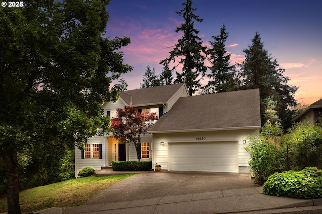 15530 SW Brighton Ct, Beaverton, OR 97007 - view of front of property featuring concrete driveway, an attached garage, a front lawn, and roof with shingles