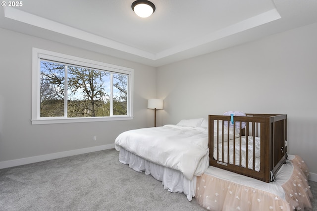 6621 NW Lolo Ter, Portland, OR 97229 - bedroom with a raised ceiling and carpet