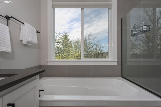 6621 NW Lolo Ter, Portland, OR 97229 - full bathroom with a garden tub and vanity