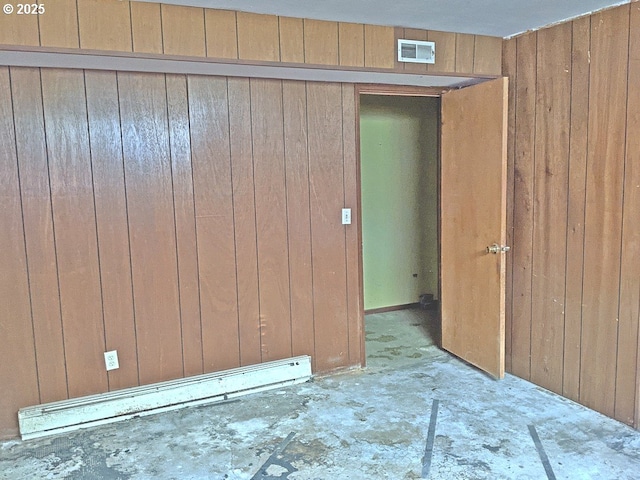 1367 NW Riverview Ave, Gresham, OR 97030 - unfurnished room featuring wooden walls and a baseboard heating unit