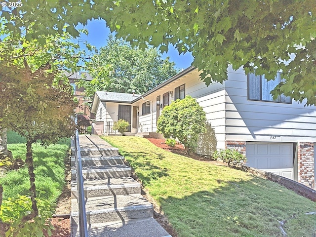 1367 NW Riverview Ave, Gresham, OR 97030 - view of front of house with an attached garage and a front yard