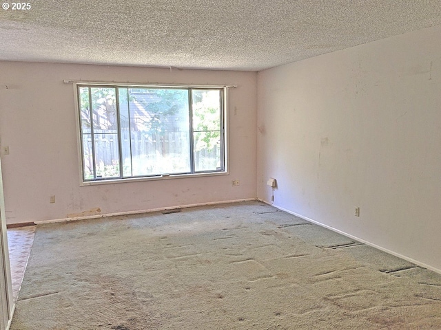 1367 NW Riverview Ave, Gresham, OR 97030 - spare room featuring carpet and a textured ceiling