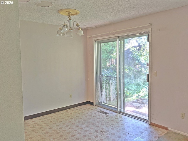 1367 NW Riverview Ave, Gresham, OR 97030 - unfurnished dining area with a chandelier and a textured ceiling