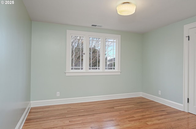 460 Bush St SE, Salem, OR 97302 - empty room with wood finished floors and baseboards