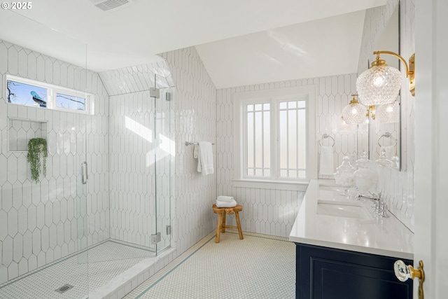 460 Bush St SE, Salem, OR 97302 - full bath featuring plenty of natural light, double vanity, a stall shower, and baseboards