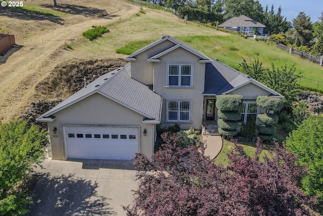 1680 NW Avery St, Roseburg, OR 97471 - traditional home featuring stucco siding, concrete driveway, a garage, and fence